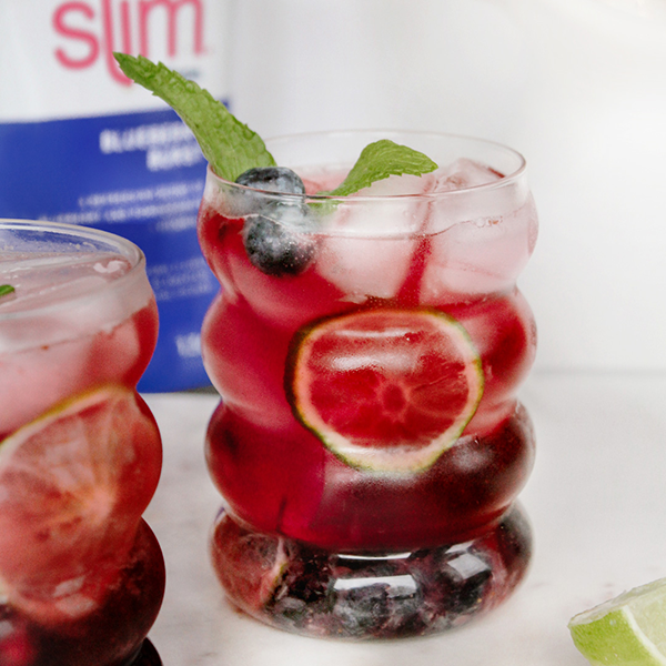 Refreshing blueberry mojito with mint garnish