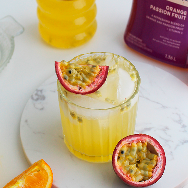 Vibrant passion fruit mocktail with mint