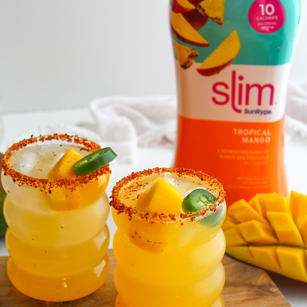 Spicy mango margarita with lime garnish